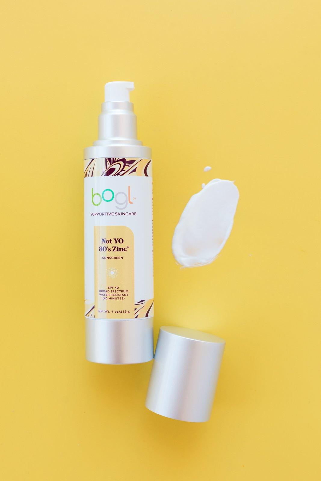 bogl's not yo 80's zinc SPF 40 on yellow background with white product smear in 4oz bottle water resistant for 40 minutes