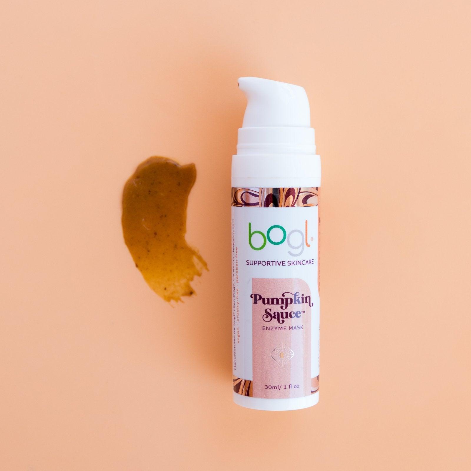 bogl's pumpkin enzyme mask dark orange product smear on light orange background for radiant skin 1oz in bottle
