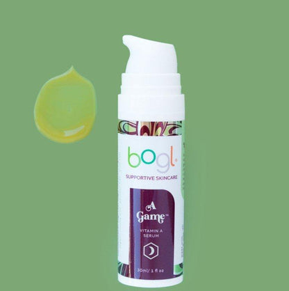 amber colored a game vitamin a serum for age management product smear on green background 1 oz